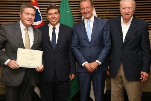 Empossado. João Marchesan, acompanhado de Josué Gomes, Paulo Skaf e Nicolau Jacob Neto